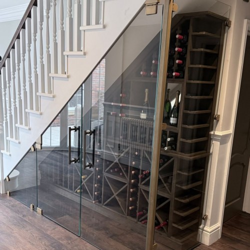 Under Stairs Glass Wine Store Cut to the Rake of the Staircase, Delamere Cheshire Under Stairs Glass Wine Store Cut to the Rake of the Staircase, Delamere Cheshire